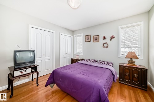 Hardwood flooring and light-toned walls throughout this room - 168 Kulawy Drive N, Edmonton, AB 