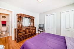 Light-toned walls with wood-finish flooring - 
