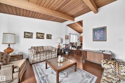 Vaulted wood-paneled ceilings with exposed beams - 