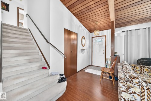 Vaulted wood-paneled ceiling with a decorative chandelier - 13804 87 Street, Edmonton, AB 