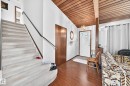 Vaulted wood-paneled ceiling with a decorative chandelier - 13804 87 Street, Edmonton, AB 