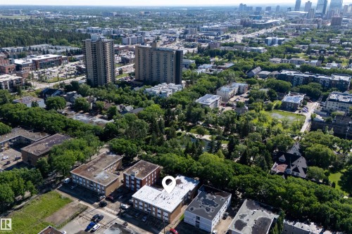 Aerial perspective of a multi-unit property within an urban setting - 6 10230 122 Street Nw, Edmonton, AB 
