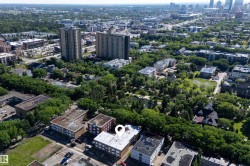 Aerial perspective of a multi-unit property within an urban setting - 