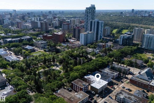 Aerial perspective showcasing a multi-story building within an urban setting - 6 10230 122 Street Nw, Edmonton, AB 