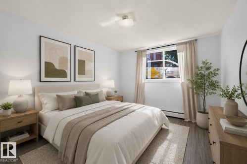 Bedroom featuring wood-finish flooring, a window with natural light, neutral wall paint, a ceiling-mounted light fixture, and baseboard heating - 6 10230 122 Street Nw, Edmonton, AB 