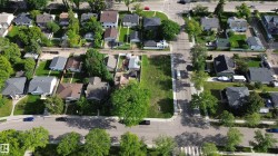 Generous land parcel featuring mature trees, a clear building site, and existing street frontage - 