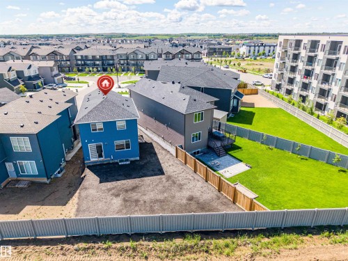 Two-story residence with a blue facade and dark shingle roof - 8426 228A Street Nw, Edmonton, AB - Outdoor