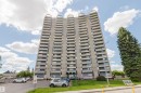 Multi-story residential building featuring a concrete facade and individual balconies - 904 10883 Saskatchewan Drive, Edmonton, AB 