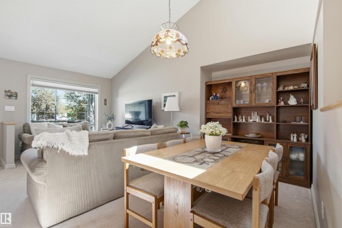 Vaulted ceiling over a combined dining and living area - 11715 11B Avenue, Edmonton, AB 