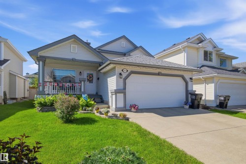 Light gray siding with dark trim accents - 11715 11B Avenue, Edmonton, AB 