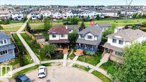 Light blue exterior with white trim and a covered front porch - 3934 160 Avenue, Edmonton, AB 