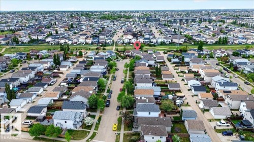Aerial perspective showcasing a residential neighborhood with tree-lined streets - 3934 160 Avenue, Edmonton, AB 