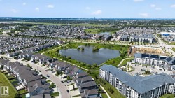 Aerial perspective showcasing a residential area with varied housing types - 