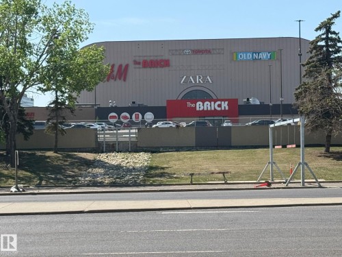 Retail building featuring multiple prominent storefronts, including H&M, The Brick, Zara, Old Navy, and Toyota - 8911 169 Street Nw, Edmonton, AB 