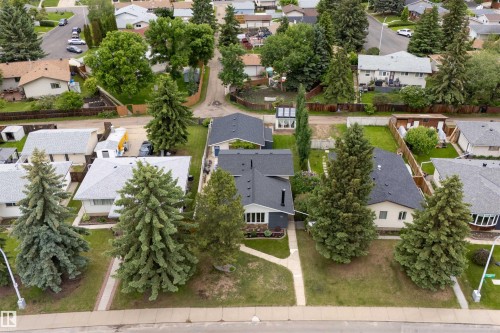 Residential street with mature trees and established landscaping - 244 Knottwood Road N, Edmonton, AB 