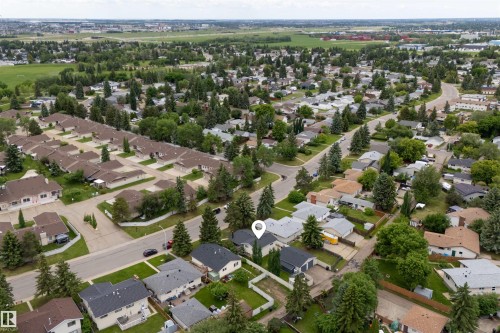 Neighborhood aerial featuring established residential streets with mature trees and green spaces - 244 Knottwood Road N, Edmonton, AB 
