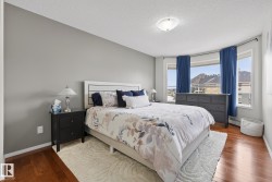 Hardwood-finish flooring extending into the bay window area - 