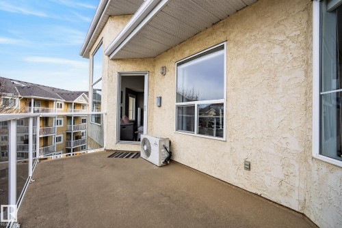 Private balcony with a concrete floor and clear panel railings - 421 9730 174 Street, Edmonton, AB 