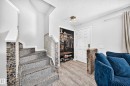 Staircase featuring pebble-stone risers and textured treads - 146 5604 199 Street, Edmonton, AB 