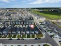 Modern residential streetscape featuring contemporary architecture - 1208 14 Ave Nw, Edmonton, AB 