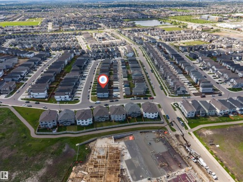 Residential property situated on a paved street within a developed neighborhood - 1208 14 Ave Nw, Edmonton, AB 