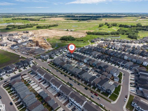 Aerial representation of a residential area featuring a mix of detached and attached homes - 1208 14 Ave Nw, Edmonton, AB 