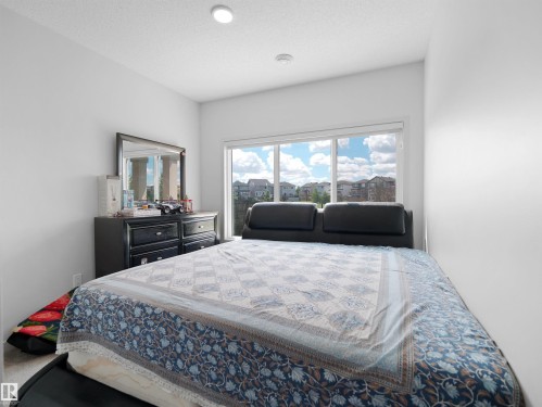 Expansive window overlooking residential architecture - 4615 175 Avenue, Edmonton, AB 