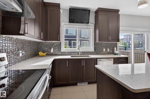 8607 Mayday Wynd, Edmonton, AB - Indoor Photo Showing Kitchen With Upgraded Kitchen
