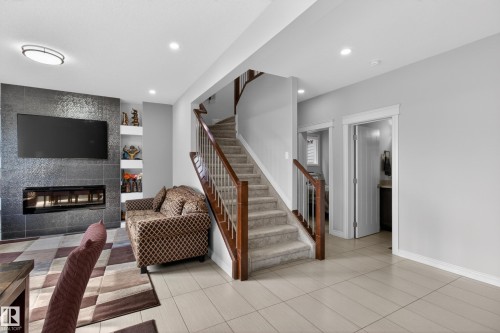 8607 Mayday Wynd, Edmonton, AB - Indoor With Fireplace