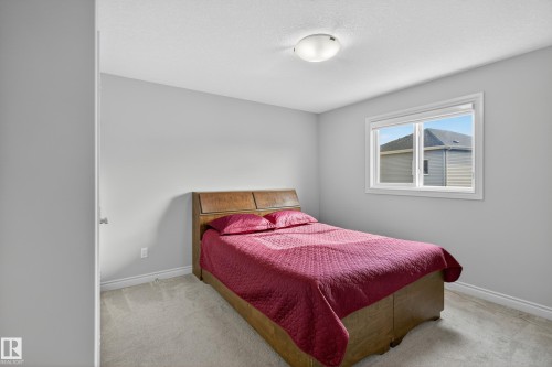 8607 Mayday Wynd, Edmonton, AB - Indoor Photo Showing Bedroom