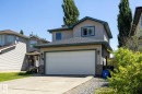 Siding exterior with complementary trim, attached garage, and concrete driveway - 60 Leyland Way, Spruce Grove, AB 