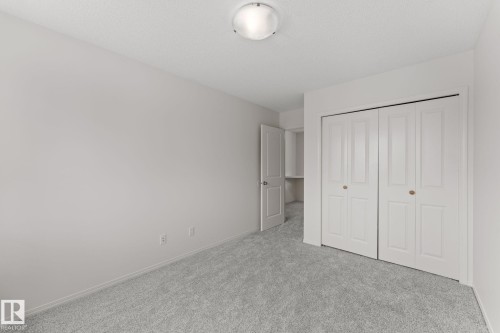 Room featuring light gray carpeting and white walls - 12523 171 Avenue, Edmonton, AB 
