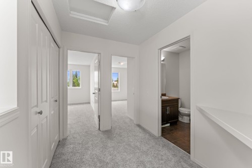 Upper-level hallway with light gray carpeting - 12523 171 Avenue, Edmonton, AB 