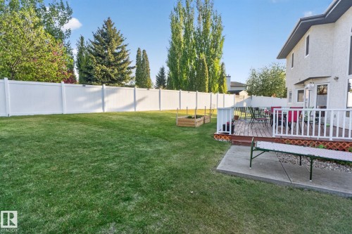 Expansive green lawn with a full white privacy fence - 4615 43A Avenue, Edmonton, AB - Outdoor