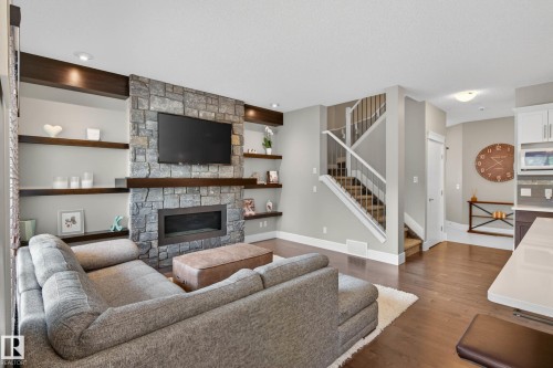 3411 Abbott Way, Edmonton, AB - Indoor Photo Showing Living Room With Fireplace
