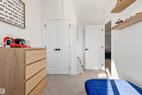White interior walls with light-colored carpeting - 7 Tenor Link, Spruce Grove, AB 