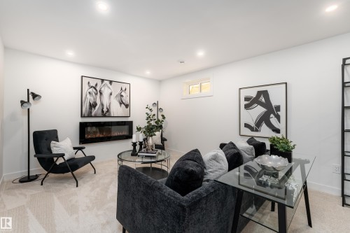 8728 72 Street, Edmonton, AB - Indoor Photo Showing Living Room With Fireplace