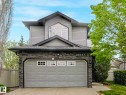 Two-story residence featuring grey siding and stone veneer accents - 1325 Latta Crescent, Edmonton, AB  - Outdoor 
