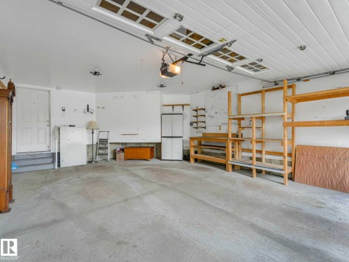 Image quality insufficient for description - 1325 Latta Crescent, Edmonton, AB - Indoor Photo Showing Garage