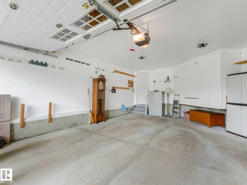 Image quality insufficient for description - 1325 Latta Crescent, Edmonton, AB - Indoor Photo Showing Garage