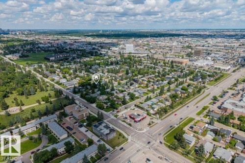 Aerial perspective showcasing a residential area with dense tree coverage - 10544 53 Avenue, Edmonton, AB 