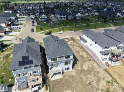 Light blue exterior with dark gray roofing - 