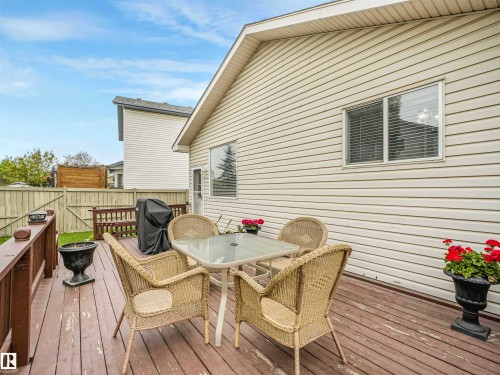 Wood-finish deck with a perimeter railing - 13825 128A Avenue, Edmonton, AB - Outdoor With Deck Patio Veranda With Exterior