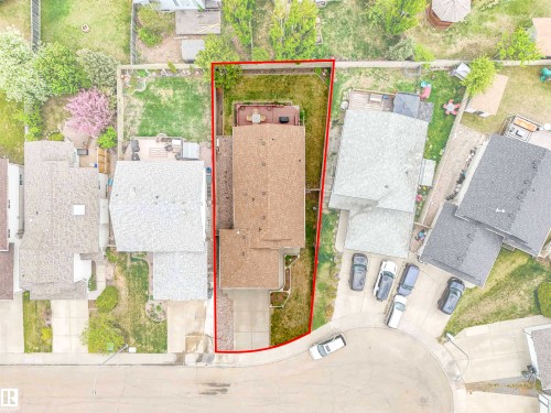 Gable roofline property situated on a cul-de-sac with an attached garage and a concrete driveway - 13825 128A Avenue, Edmonton, AB - Outdoor