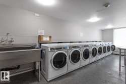 Building laundry room featuring multiple washing machines and dryers. There are multiple floors with laundry rooms - get more loads done at once! - 
