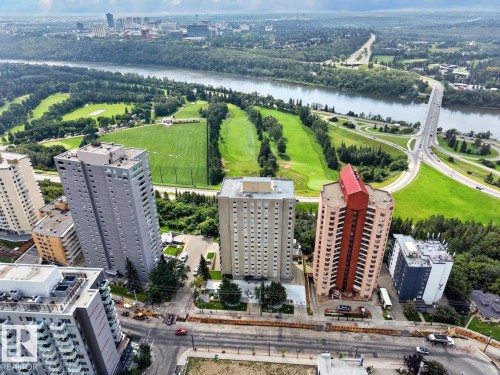 Front Exterior; Suite has south, river valley view; - #602 12303 Jasper Av Nw, Edmonton, AB - Outdoor With Body Of Water With View