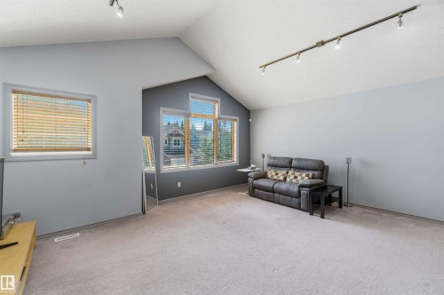 Vaulted ceiling with track lighting system - 3061 Spence Wynd, Edmonton, AB 