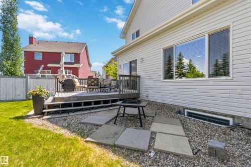 Exterior siding with a multi-tiered deck - 3061 Spence Wynd, Edmonton, AB 