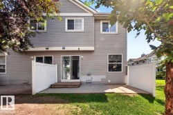 Rear elevation featuring horizontal siding - 