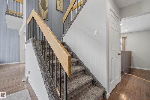 Two-story entryway with wood-finish flooring - 2712 104 Street, Edmonton, AB 